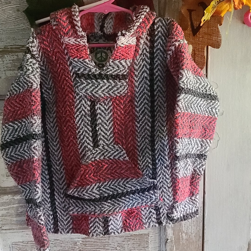 Poncho girls size med probably size 7